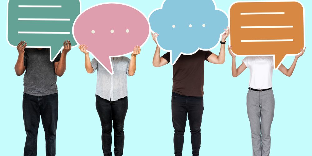 diverse-people-showing-speech-bubble-symbols
