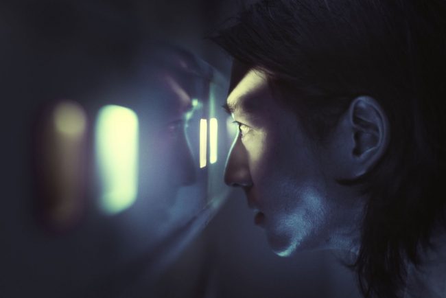 Optimized-iris-scanner-man-using-biometrics-unlock-door (1)